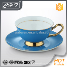Taza de té de China de hueso de la multa del color del nuevo producto de la venta caliente y sistema del platillo